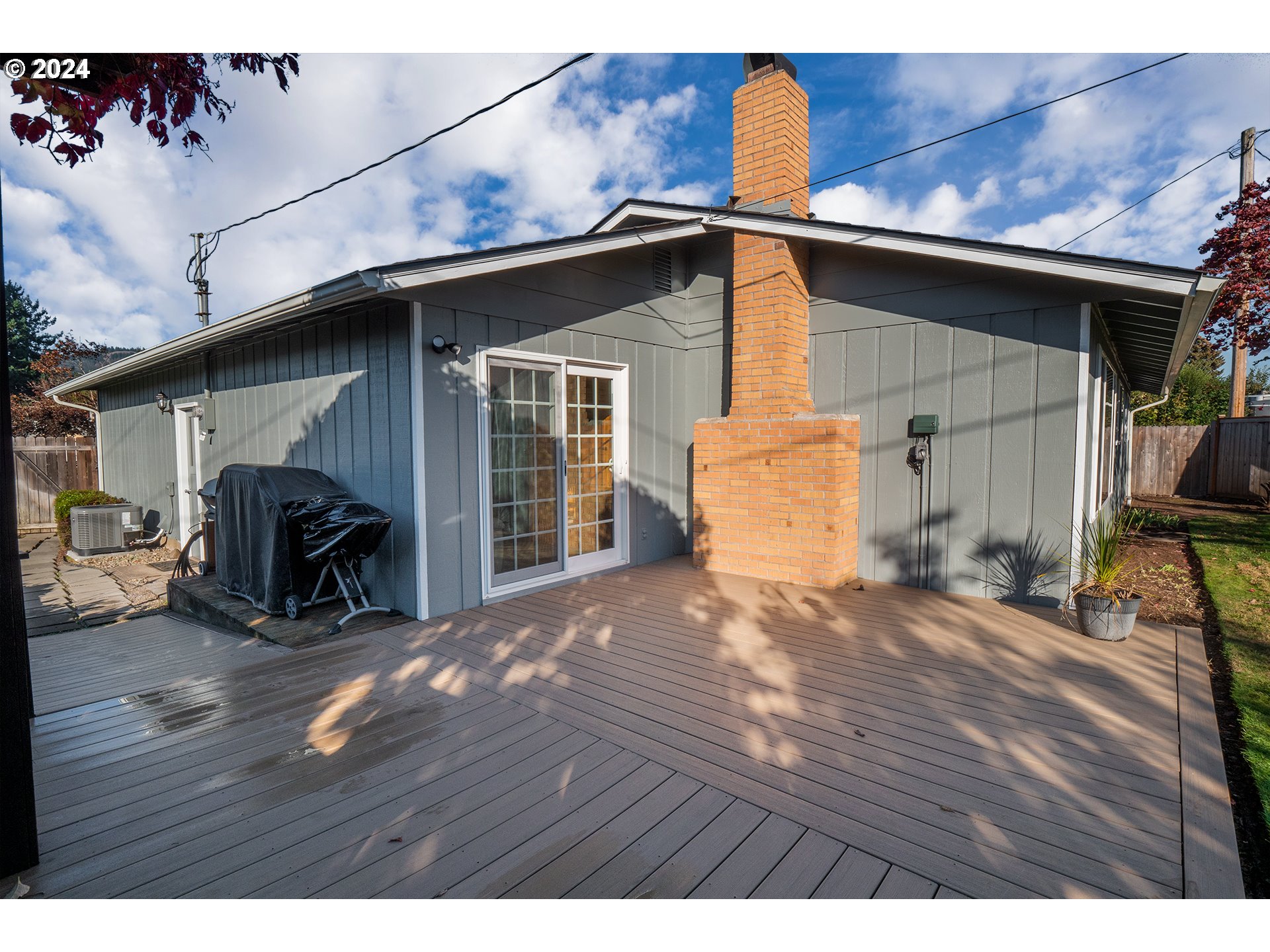 2556 Dumas Drive Springfield, OR 97477 - Photo 36 of 48 a view of outdoor space with wooden floor and seating space