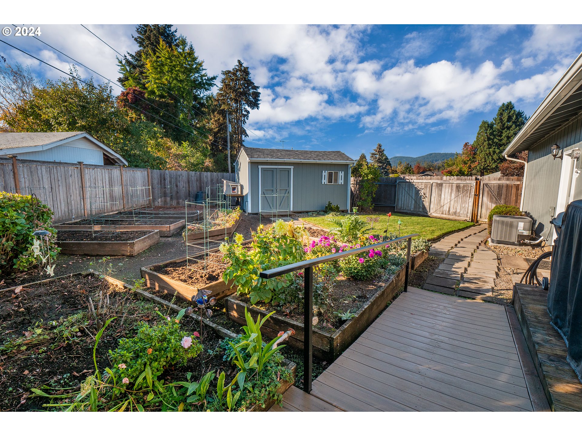 2556 Dumas Drive Springfield, OR 97477 - Photo 43 of 48 a view of a backyard with sitting area