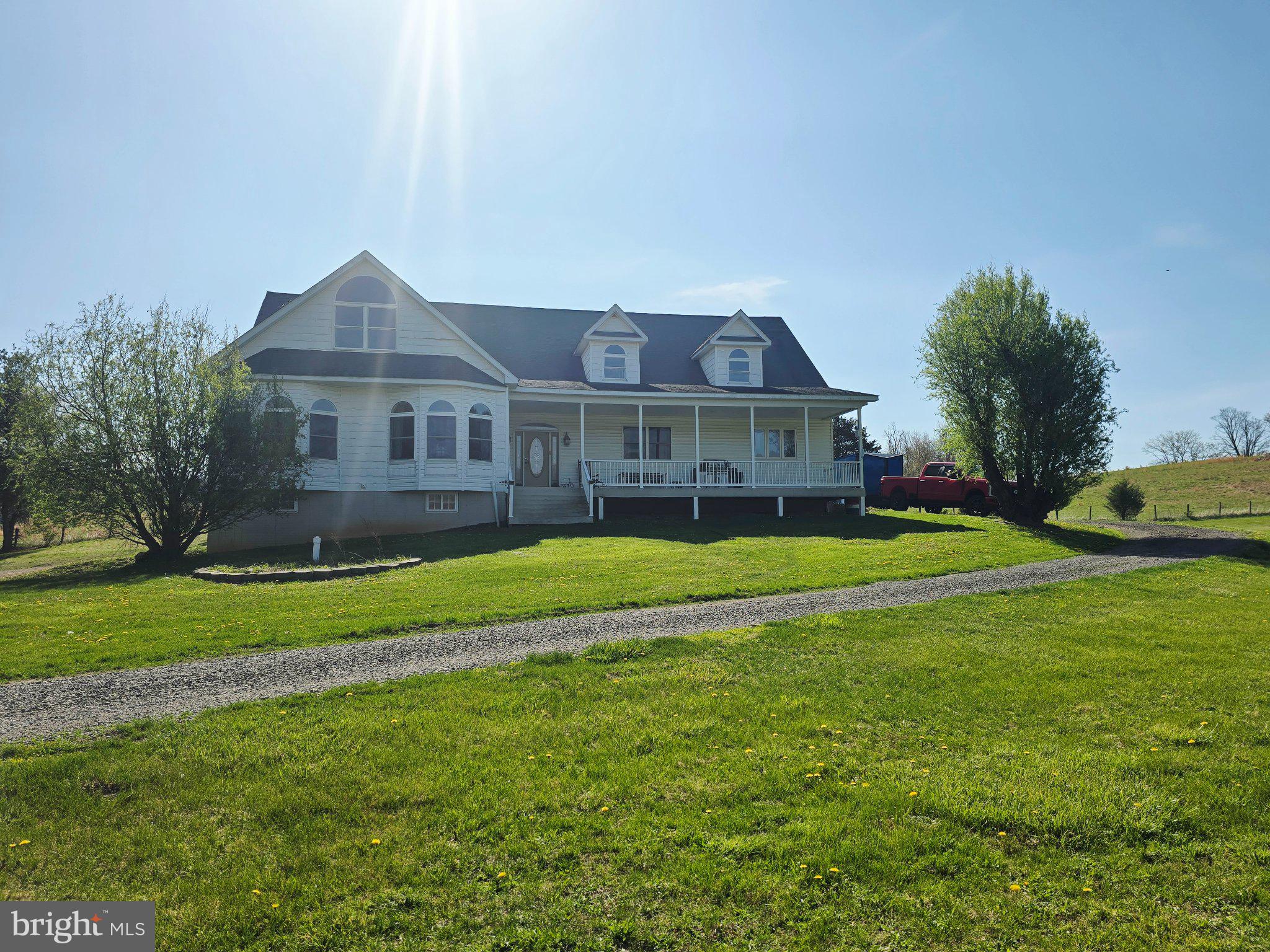 540 Plum Run Road Sugar Grove, WV 26815 - Photo 3 of 45 Charming home on a sunlit lawn.