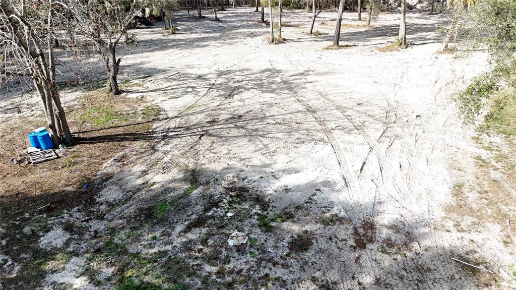 12510 Robinhood Road Hudson, FL 34669 - Photo 3 of 12 a view of a backyard of the house