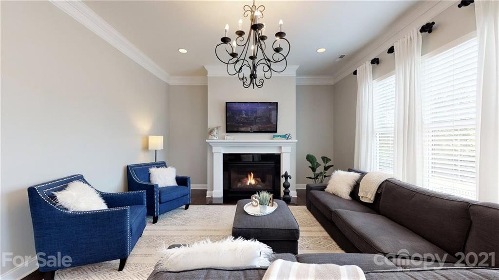 1000 Fallondale Road Waxhaw, NC 28173 - Photo 20 of 48 a living room with furniture a fireplace and window