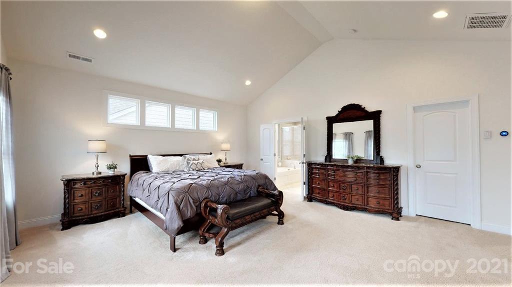 1000 Fallondale Road Waxhaw, NC 28173 - Photo 28 of 48 a bedroom with a bed and a dresser