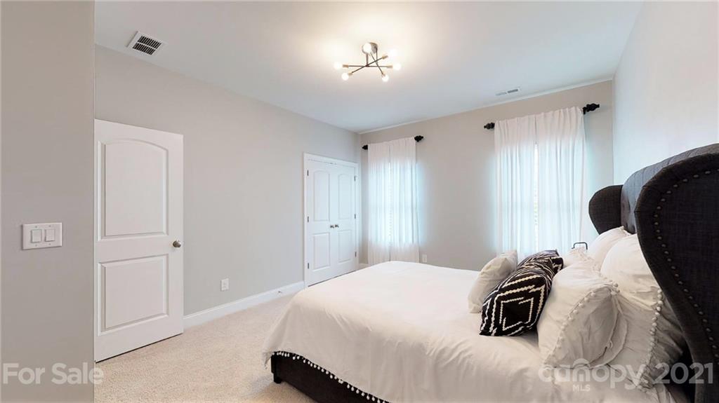 1000 Fallondale Road Waxhaw, NC 28173 - Photo 38 of 48 a bedroom with a bed and a window