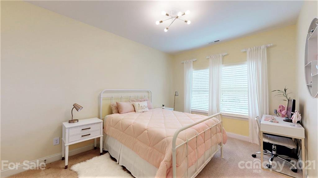 1000 Fallondale Road Waxhaw, NC 28173 - Photo 40 of 48 a bedroom with a bed and a tv