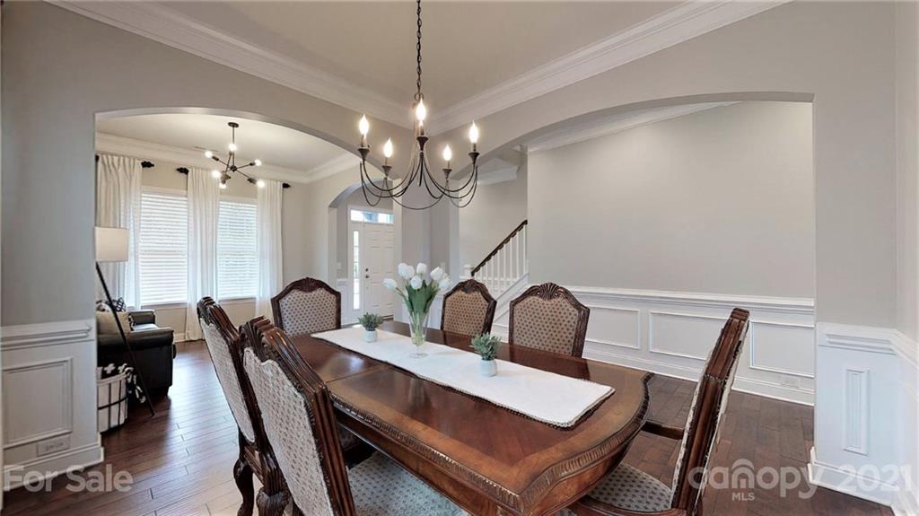1000 Fallondale Road Waxhaw, NC 28173 - Photo 8 of 48 a view of a dining room with furniture and wooden floor