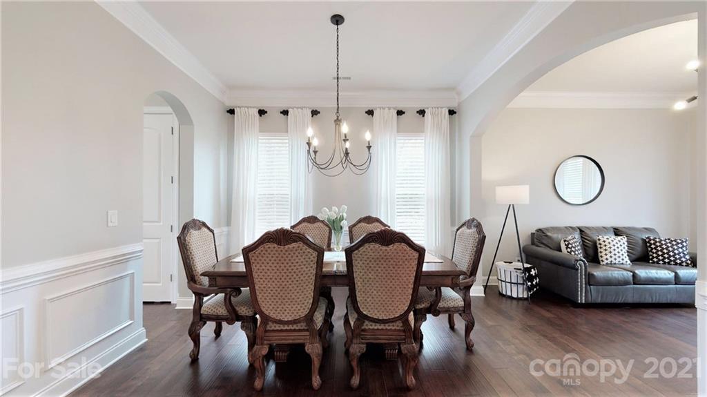 1000 Fallondale Road Waxhaw, NC 28173 - Photo 10 of 48 a view of a dining room with furniture window and wooden floor
