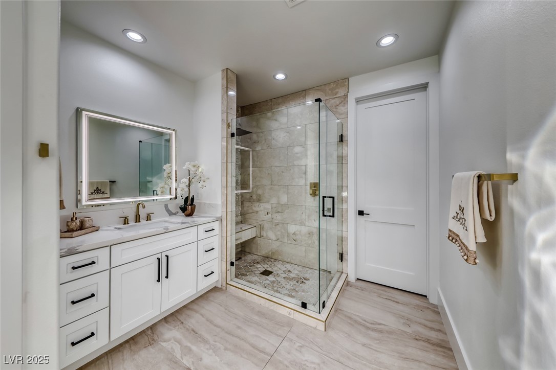 2309 Prometheus Court Henderson, NV 89074 - Photo 41 of 86 Full bath with vanity, a shower stall, and recessed lighting