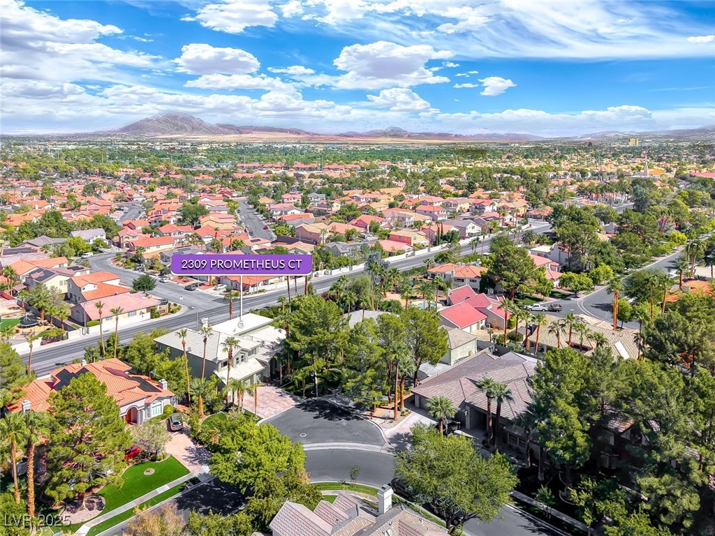 2309 Prometheus Court Henderson, NV 89074 - Photo 82 of 86 Aerial perspective of suburban area with a mountainous background