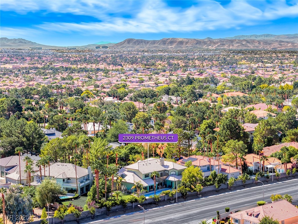 2309 Prometheus Court Henderson, NV 89074 - Photo 83 of 86 Aerial view of residential area featuring a mountain backdrop