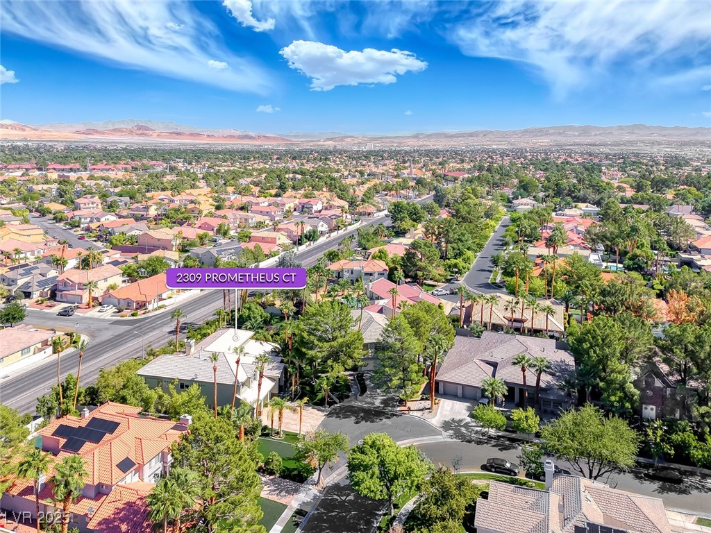 2309 Prometheus Court Henderson, NV 89074 - Photo 86 of 86 Aerial view of residential area with a mountain backdrop