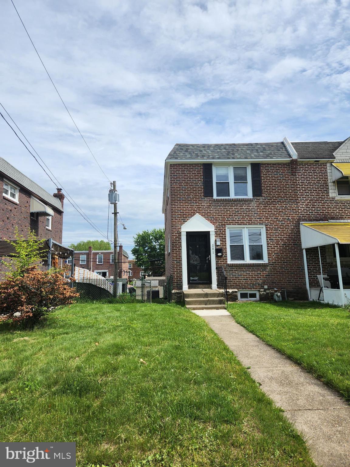 a front view of house with yard