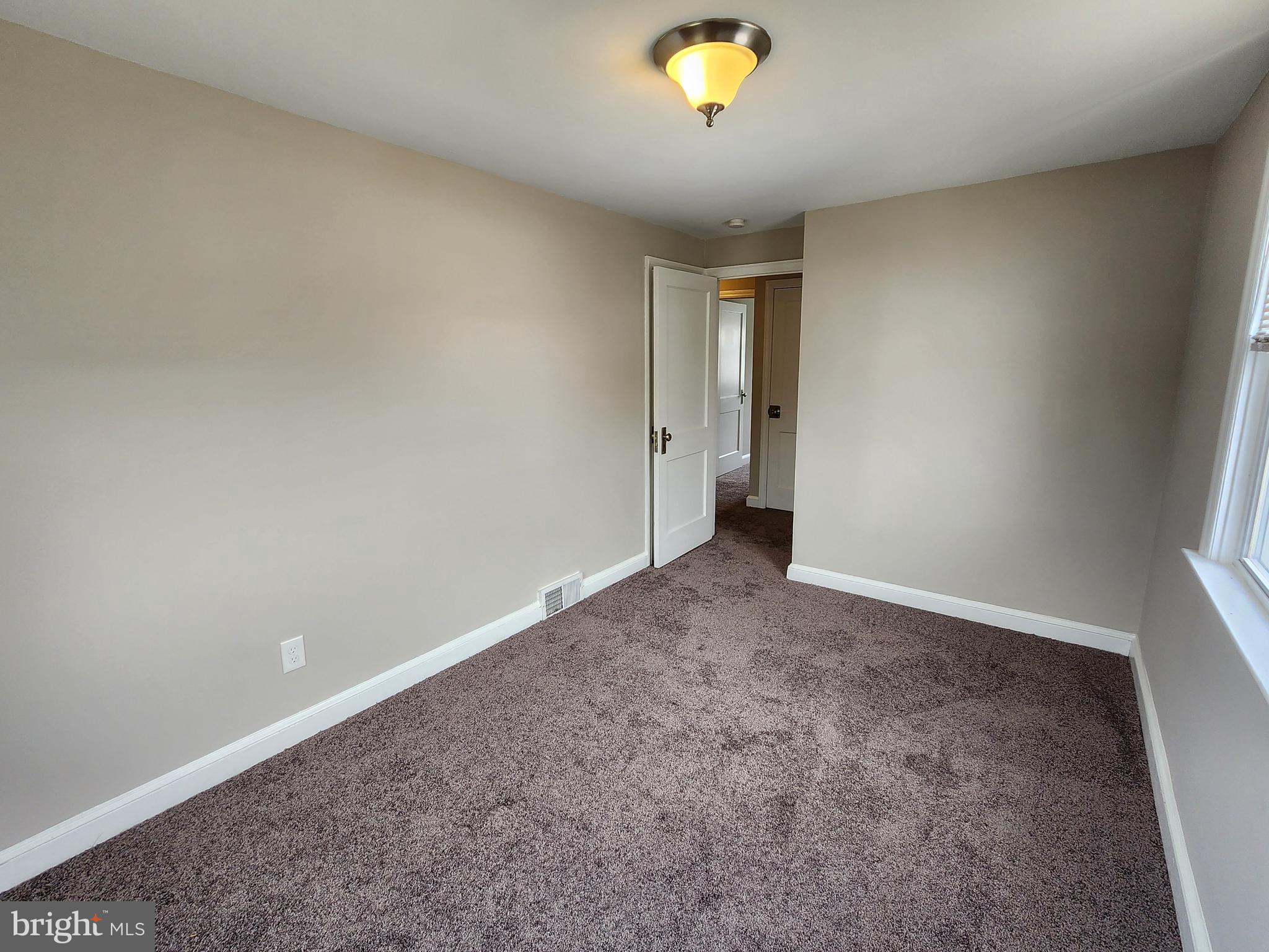 201 Westbridge Road Glenolden, PA 19036 - Photo 13 of 24 an empty room with a window