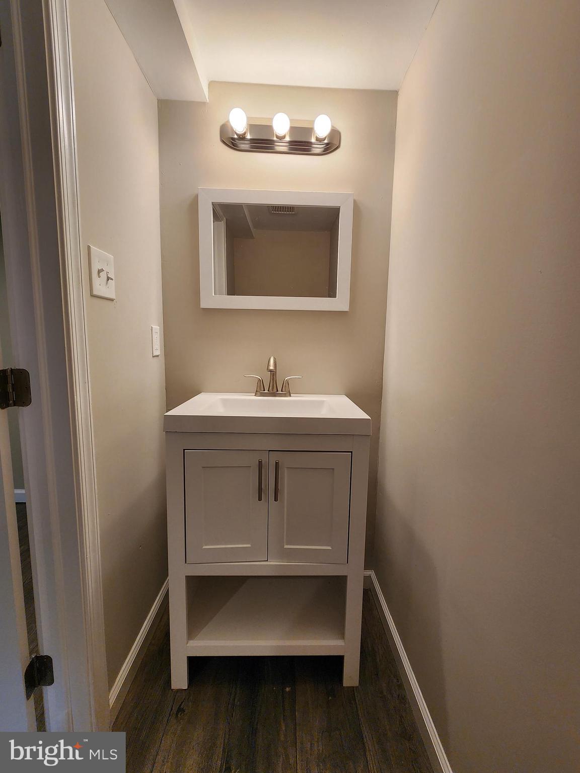 201 Westbridge Road Glenolden, PA 19036 - Photo 19 of 24 a bathroom with a sink and a mirror