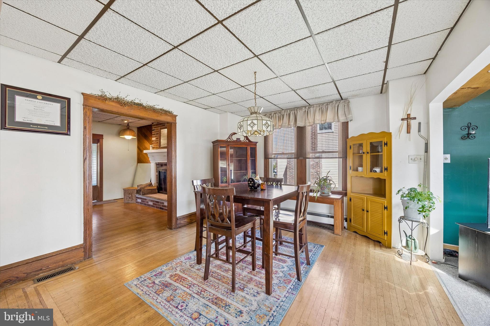 620 Gilbert Road Ridley Park, PA 19078 - Photo 8 of 35 a view of a dining room with furniture window and wooden floor