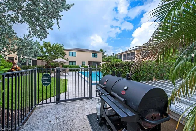 a view of a small yard and furniture