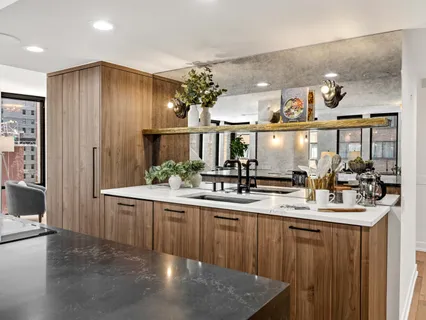 a view of a kitchen and dining room