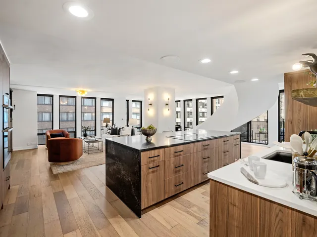 a room with a furniture and a toilet