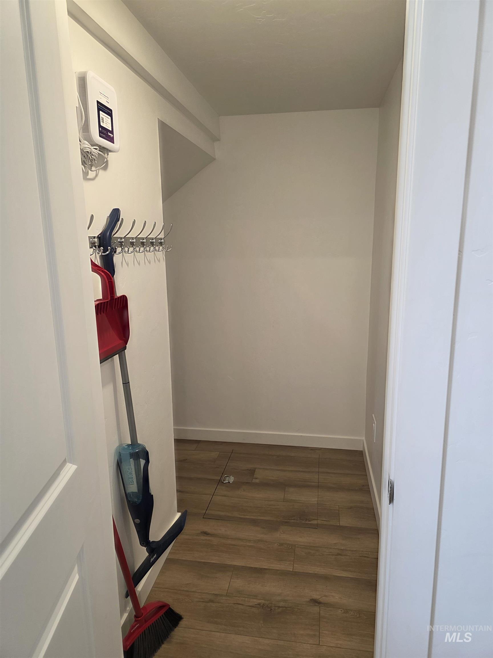 168 North Stratus Way Eagle, ID 83616 - Photo 13 of 35 Hall featuring dark wood-type flooring and baseboards