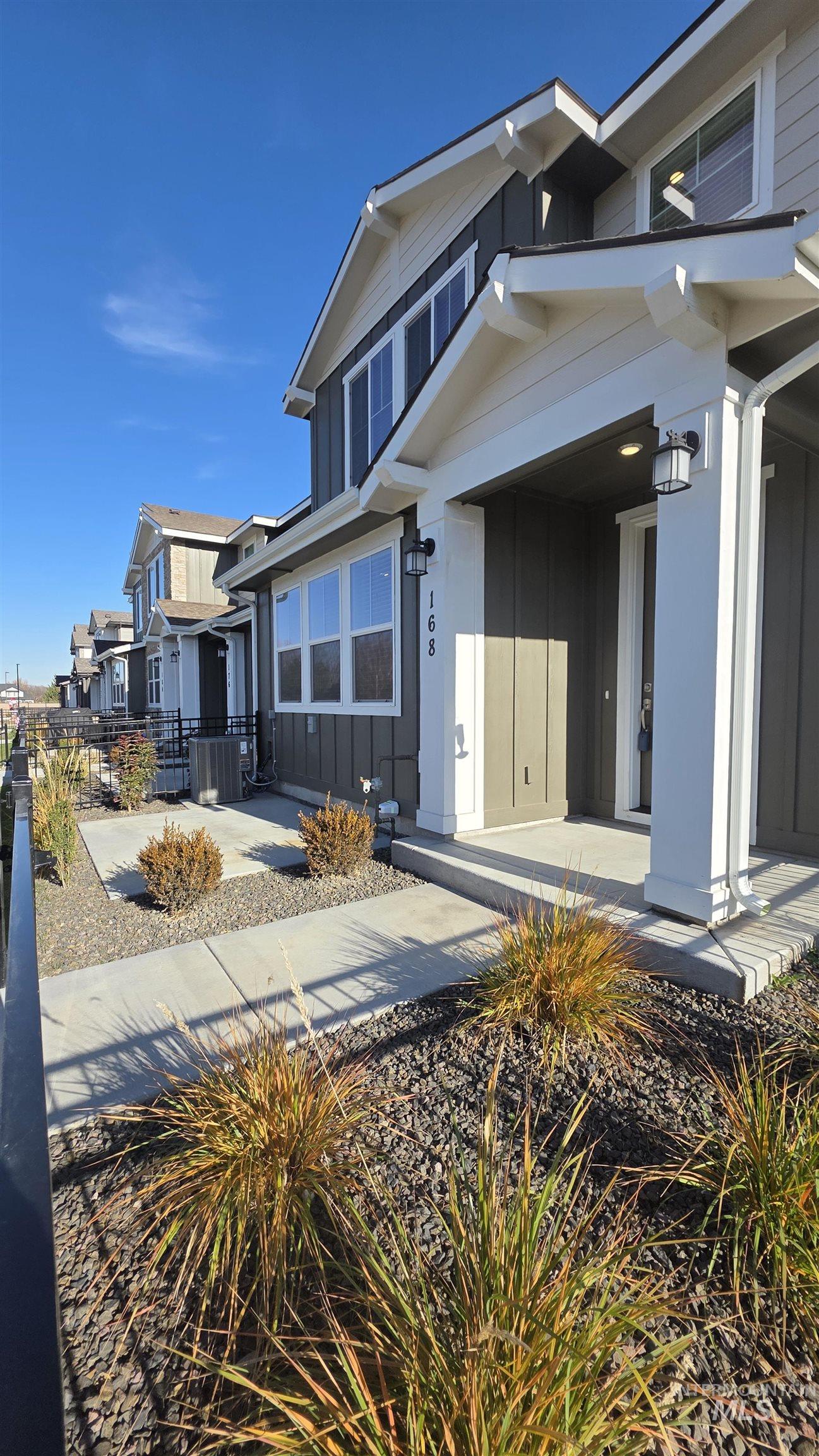 168 North Stratus Way Eagle, ID 83616 - Photo 32 of 35 View of front of property featuring board and batten siding
