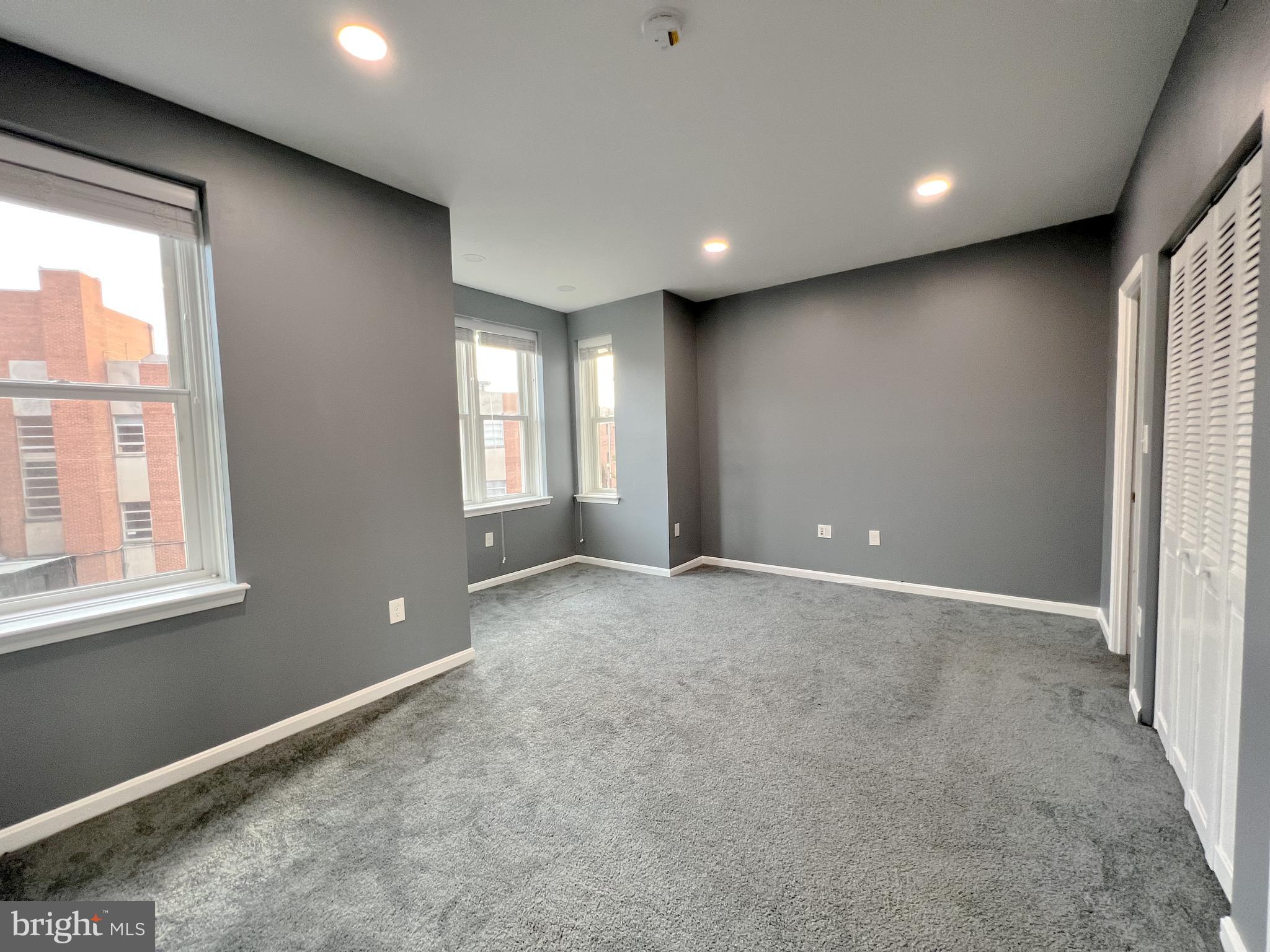 617 U Street Northwest Washington, DC 20001 - Photo 15 of 27 an empty room with windows