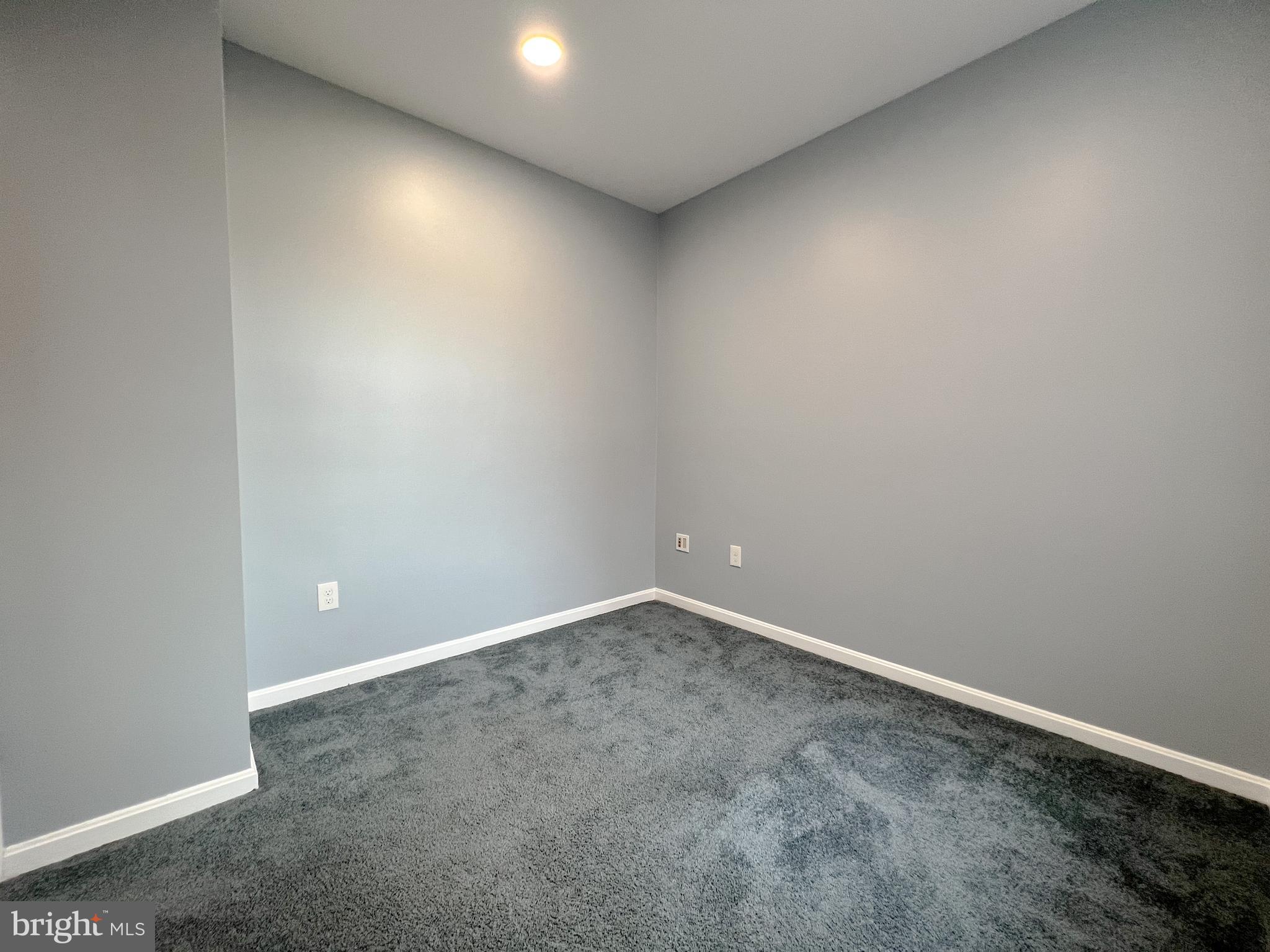 617 U Street Northwest Washington, DC 20001 - Photo 22 of 27 an empty room with a workbench