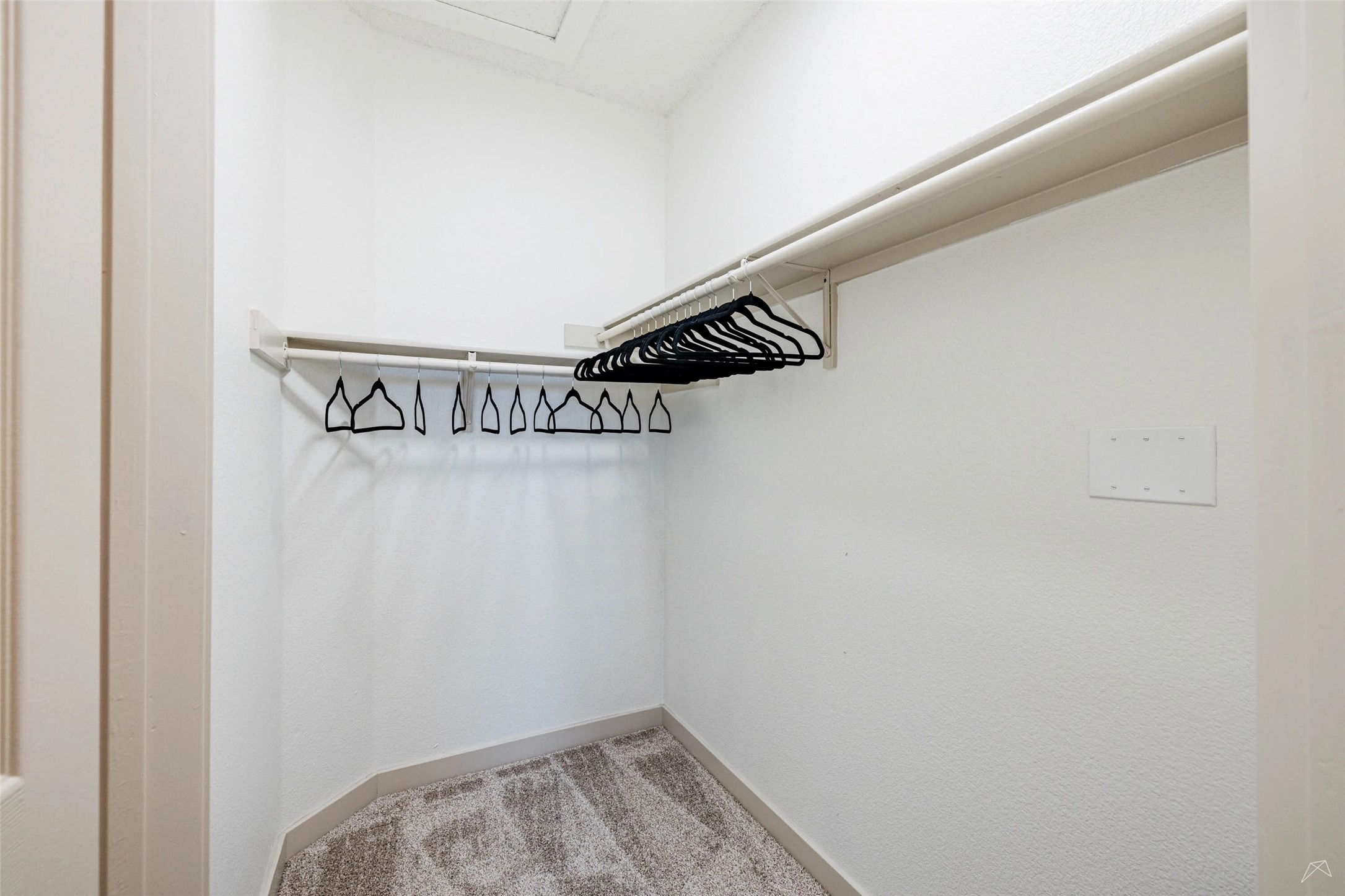 11908 Anderson Mill Road, Unit 822 Austin, TX 78726 - Photo 20 of 23 Walk in closet with light carpet