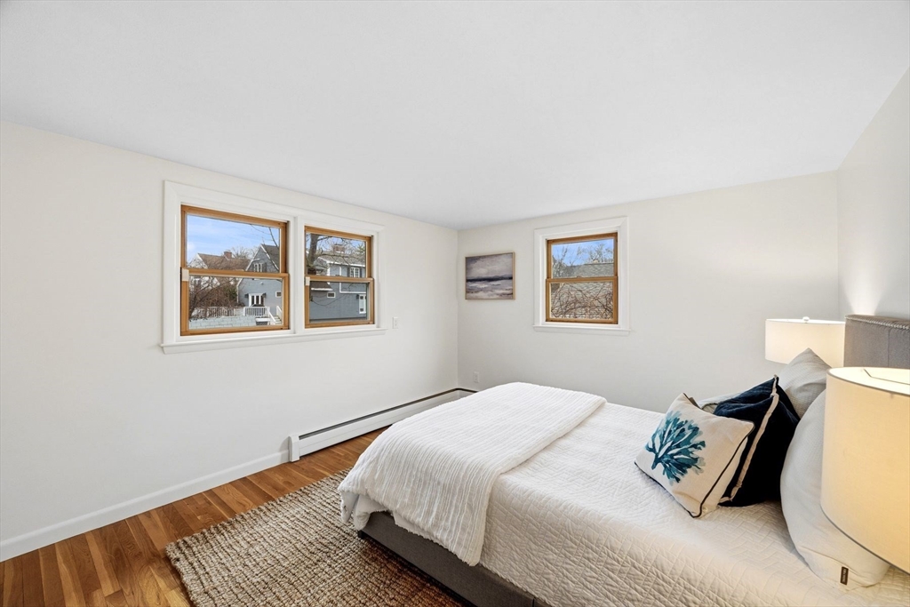 78 Bayview Road Marblehead, MA 01945 - Photo 20 of 30 a bedroom with a bed and a window
