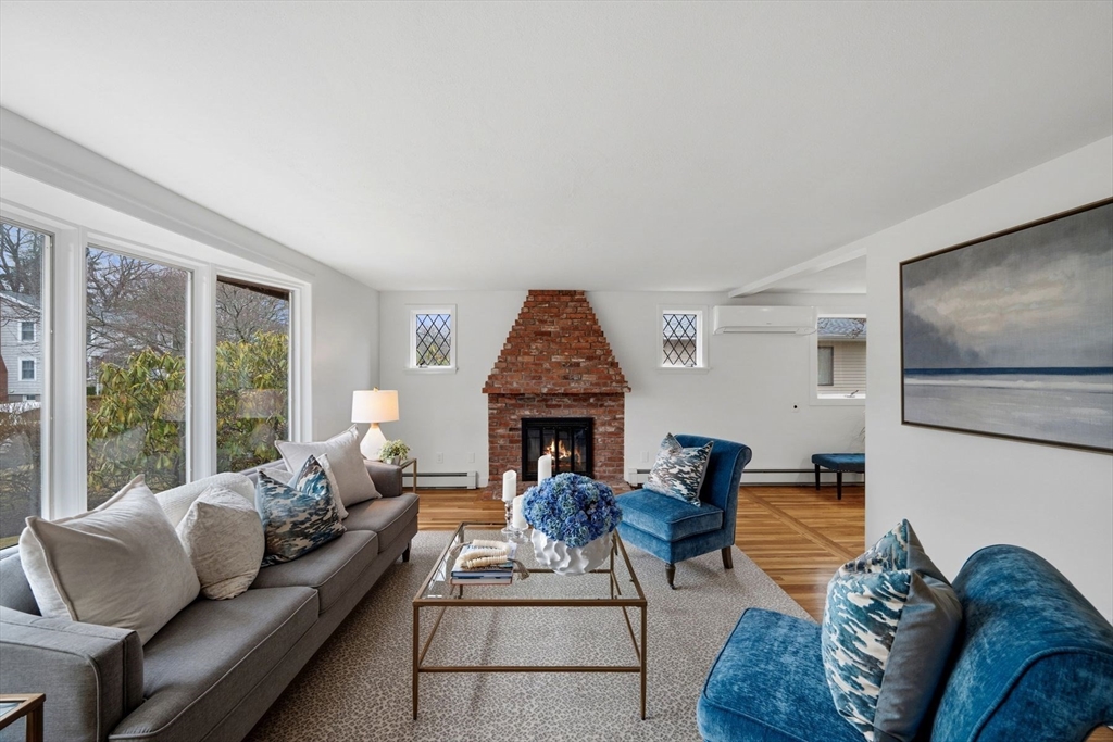 78 Bayview Road Marblehead, MA 01945 - Photo 8 of 30 a living room with furniture fireplace and large window