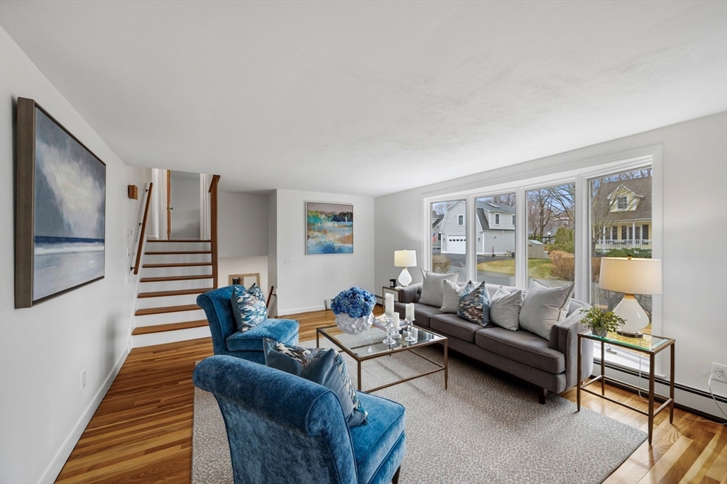 78 Bayview Road Marblehead, MA 01945 - Photo 9 of 30 a living room with furniture and a wooden floor