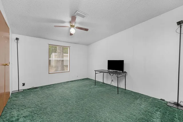 a room with furniture and a wooden floor