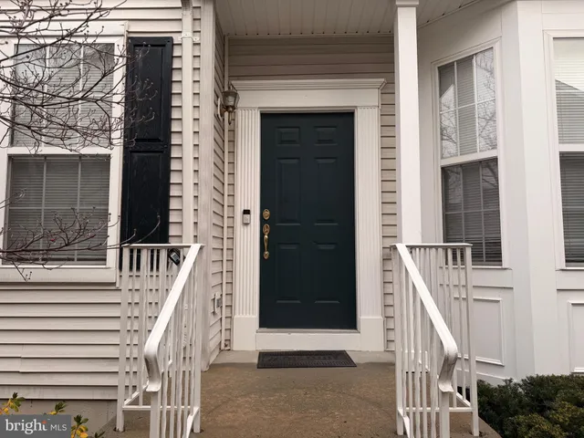 a view of entryway with a front door