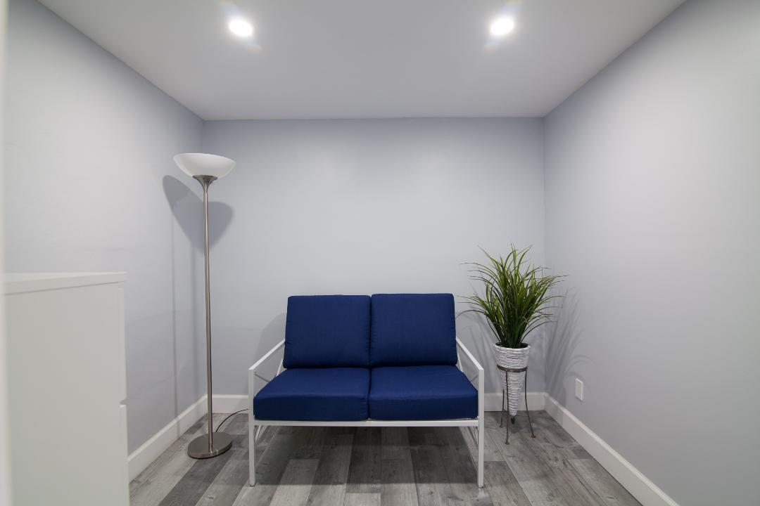 320 South Surf Road, Unit 205 Hollywood, FL 33019 - Photo 11 of 18 a living room with furniture and a potted plant