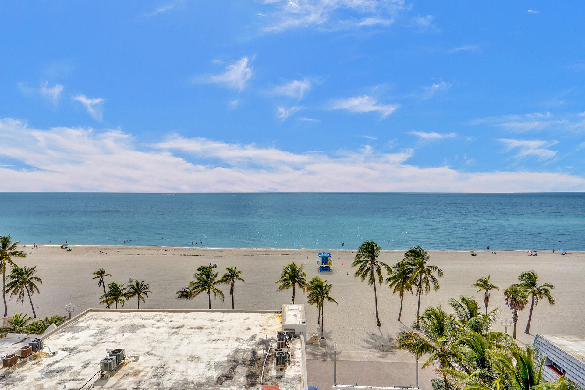320 South Surf Road, Unit 205 Hollywood, FL 33019 - Photo 17 of 18 a view of ocean with a palm tree
