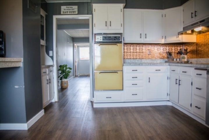 200 North Front Street Sublette, IL 61367 - Photo 14 of 35 a view of a kitchen with wooden floor