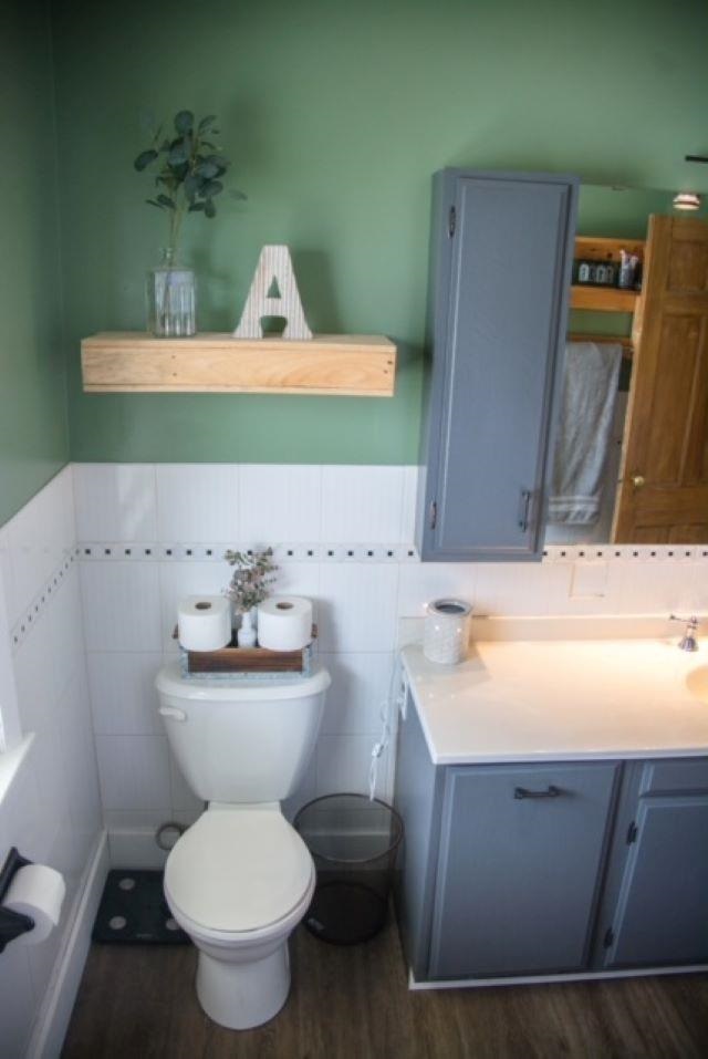 200 North Front Street Sublette, IL 61367 - Photo 17 of 35 a bathroom with a sink toilet and mirror