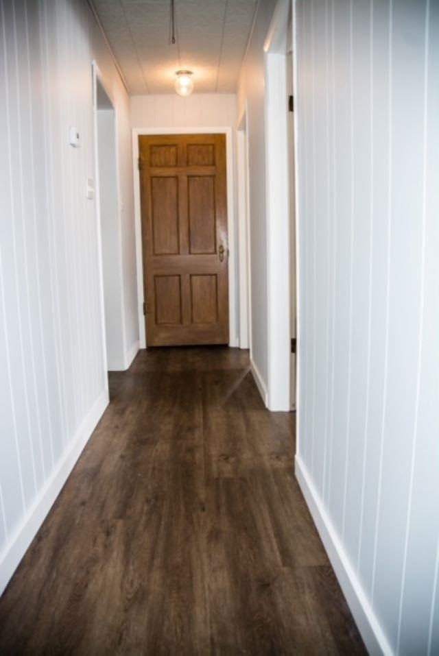 200 North Front Street Sublette, IL 61367 - Photo 25 of 35 a view of a hallway with wooden floor
