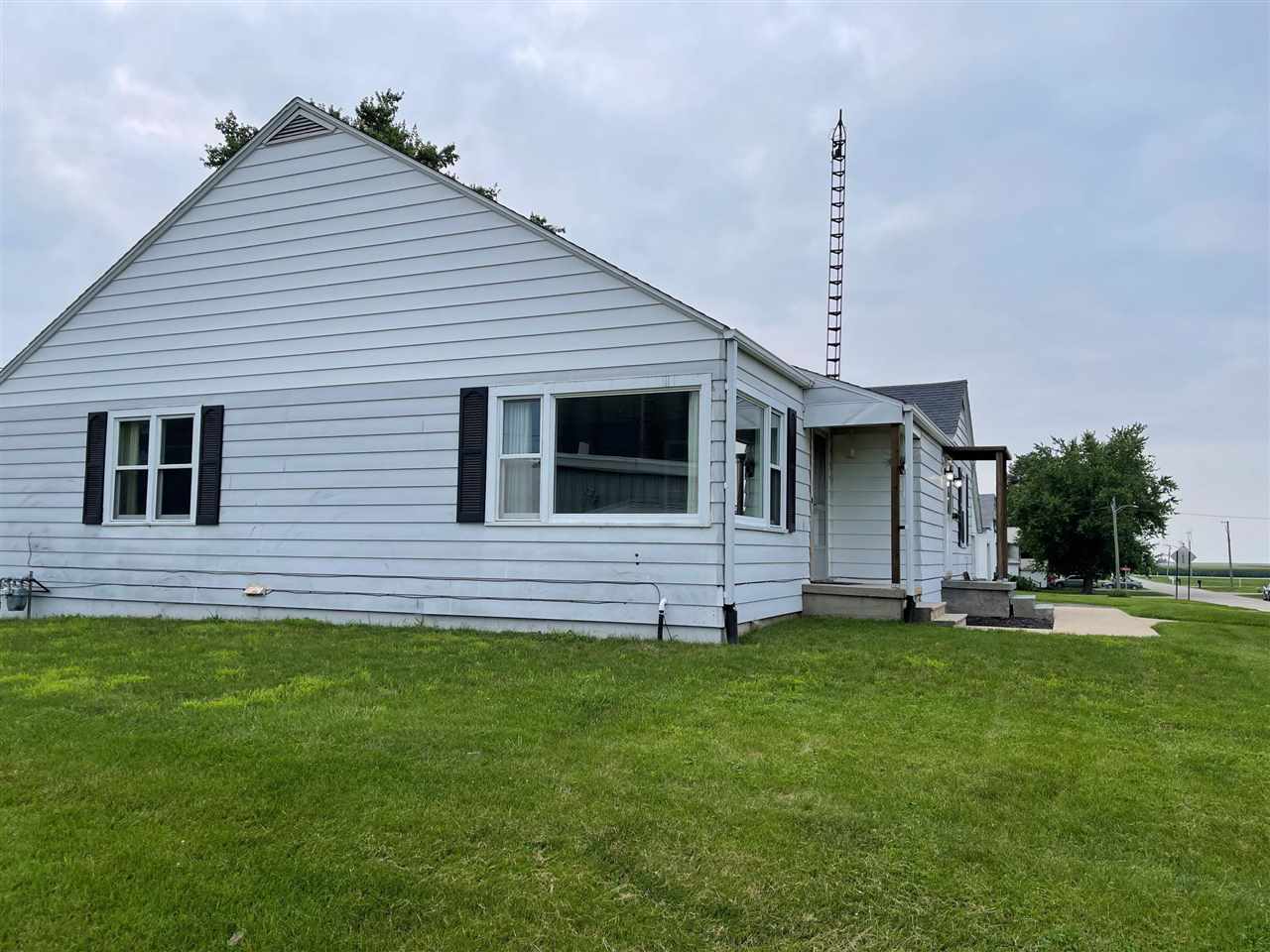 200 North Front Street Sublette, IL 61367 - Photo 32 of 35 a front view of a house with a yard and garage