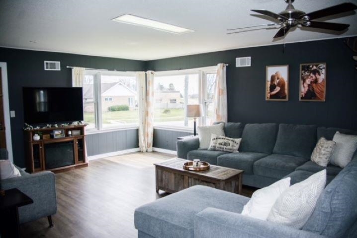 200 North Front Street Sublette, IL 61367 - Photo 5 of 35 a living room with furniture and a flat screen tv