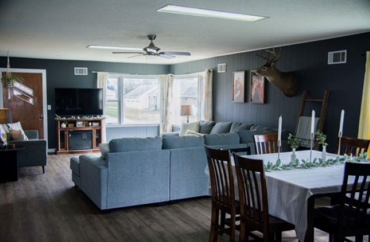 200 North Front Street Sublette, IL 61367 - Photo 8 of 35 a living room with furniture dining table and a flat screen tv