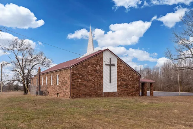a lobby with furniture and window