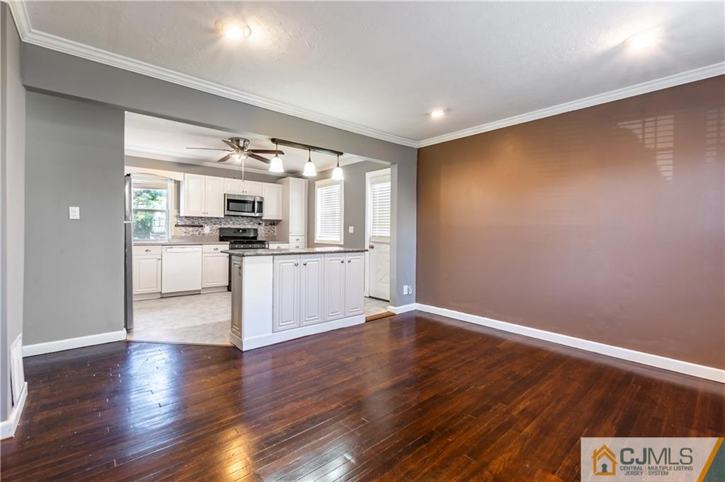 12 Jones Place Edison, NJ 08817 - Photo 11 of 28 a view of a kitchen with a sink and wooden floor