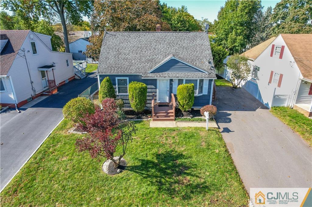 12 Jones Place Edison, NJ 08817 - Photo 2 of 28 a front view of house with yard and green space