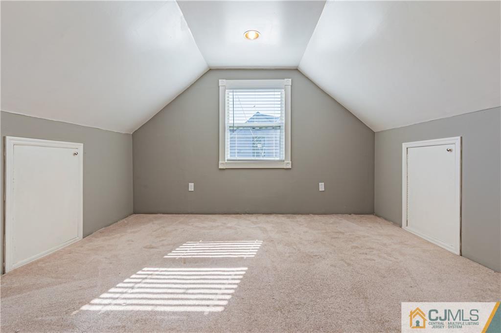 12 Jones Place Edison, NJ 08817 - Photo 24 of 28 a view of an empty room with a window