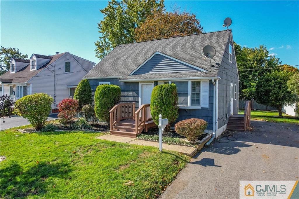 12 Jones Place Edison, NJ 08817 - Photo 4 of 28 a house view with a garden space