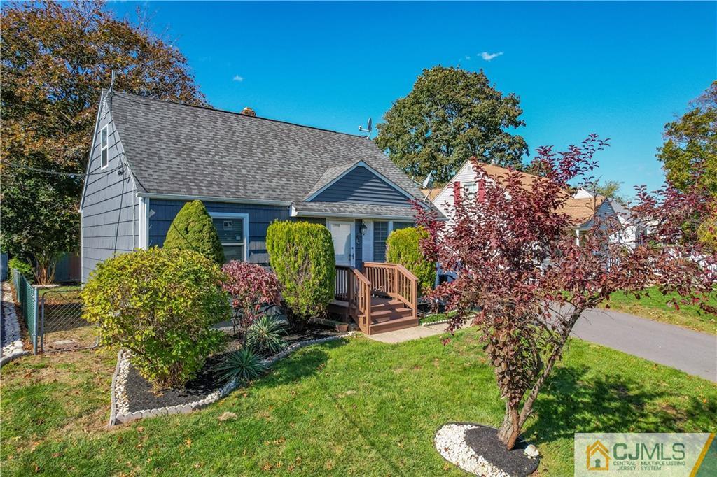 12 Jones Place Edison, NJ 08817 - Photo 5 of 28 a front view of a house with garden
