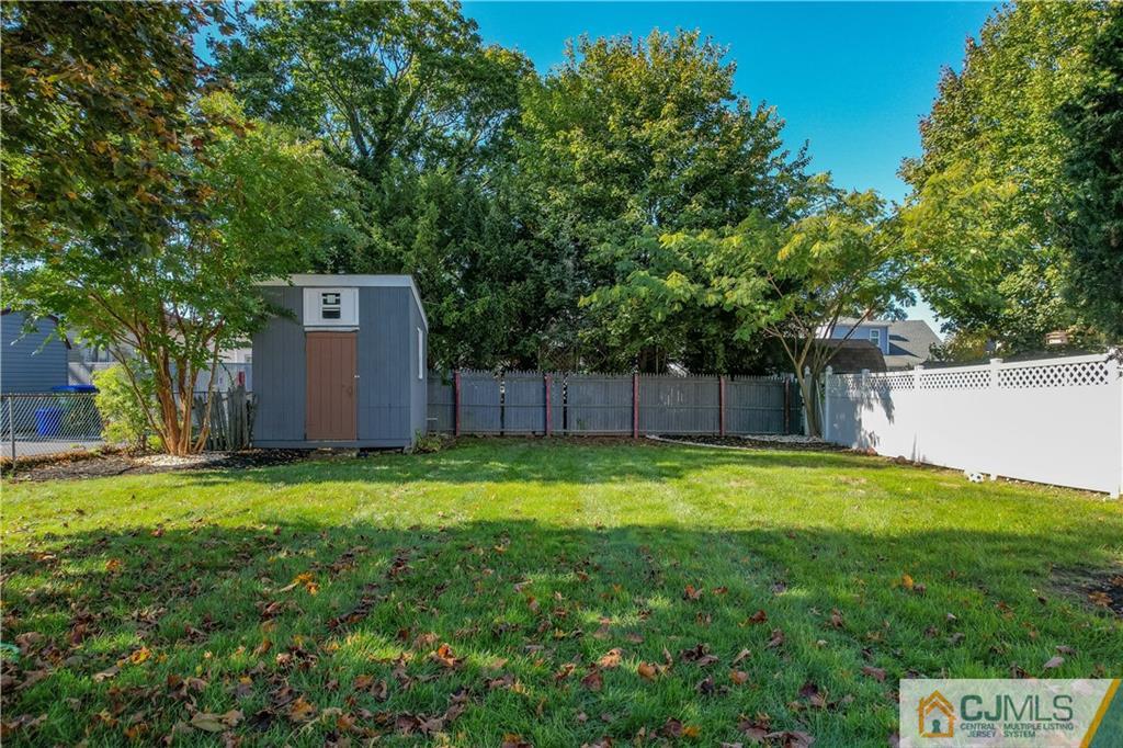12 Jones Place Edison, NJ 08817 - Photo 8 of 28 a backyard of a house and trees
