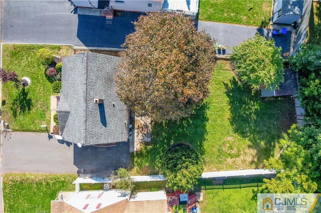 12 Jones Place Edison, NJ 08817 - Photo 9 of 28 an aerial view of a house with a yard