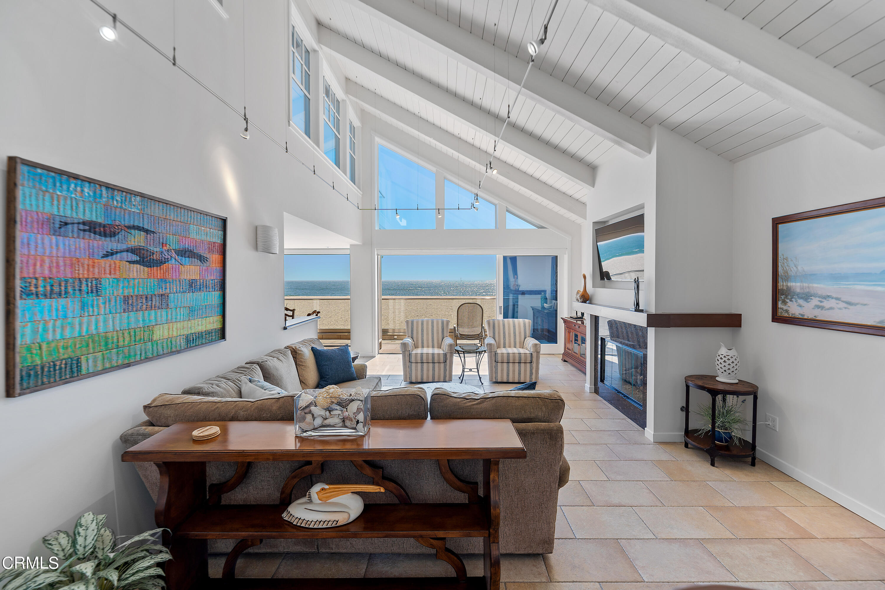 2013 Ocean Drive Oxnard, CA 93035 - Photo 18 of 60 a living room with fireplace furniture and a flat screen tv