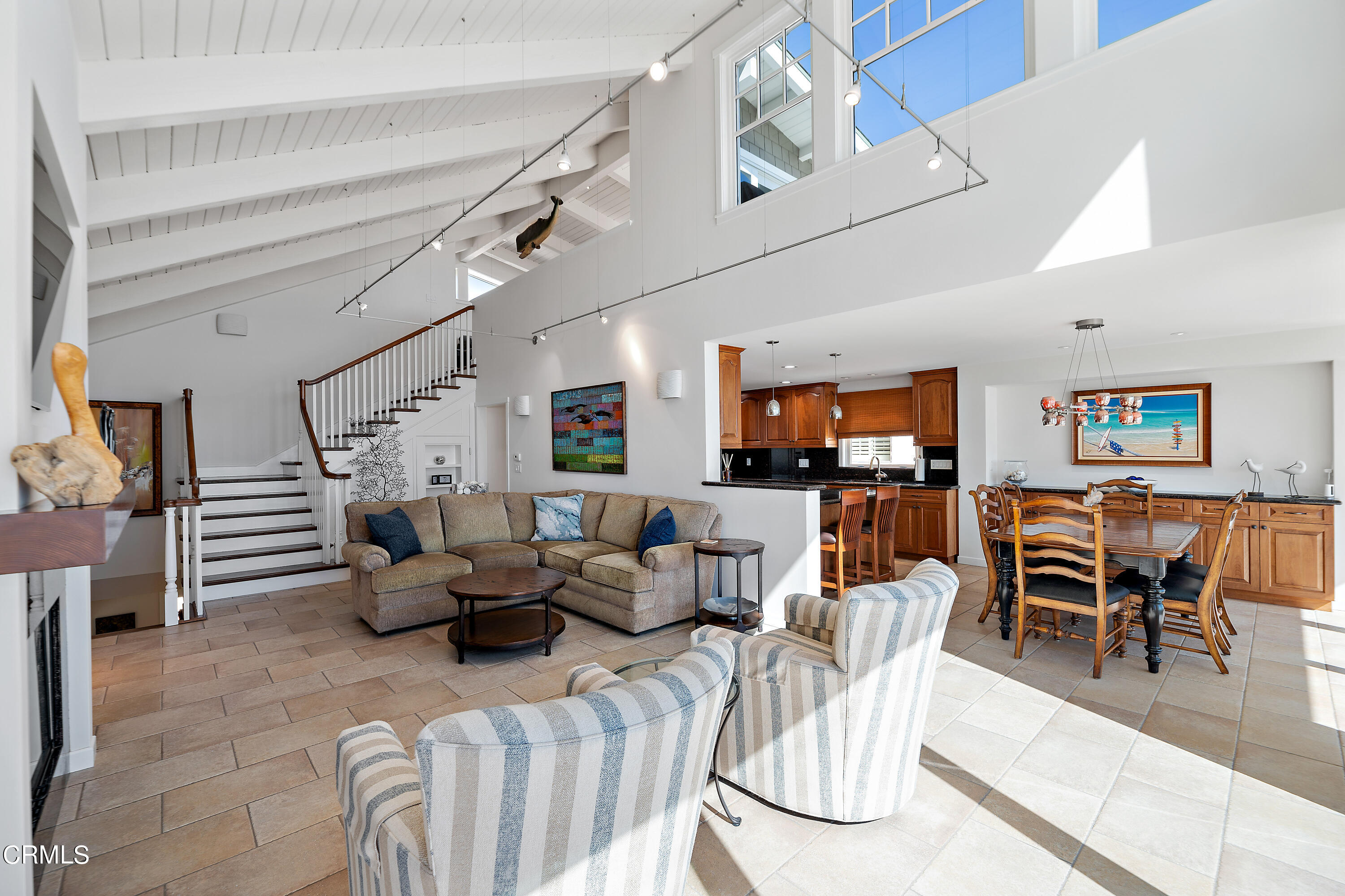 2013 Ocean Drive Oxnard, CA 93035 - Photo 20 of 60 a living room with furniture a dining table and chairs with wooden floor