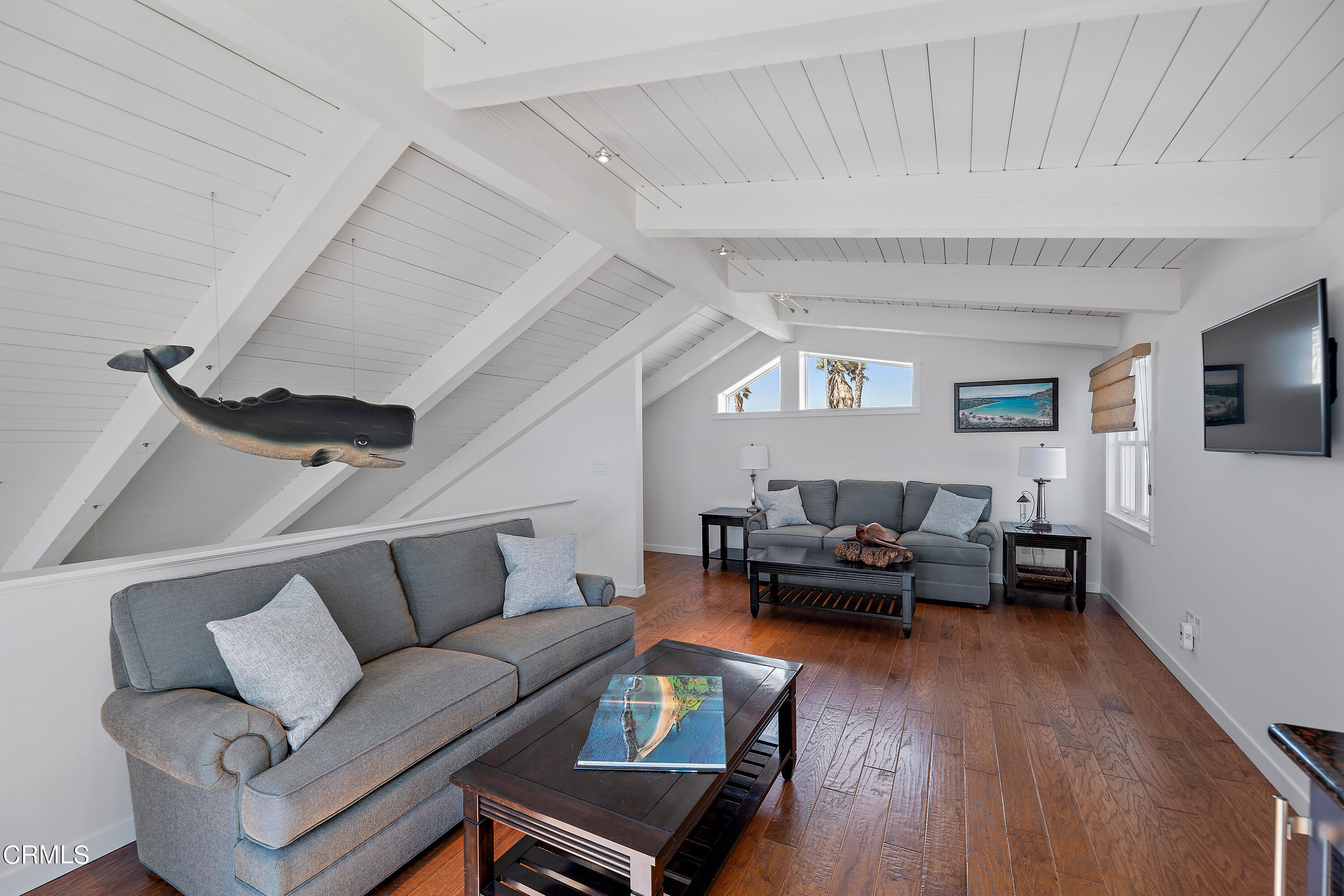2013 Ocean Drive Oxnard, CA 93035 - Photo 50 of 60 a living room with furniture and a wooden floor